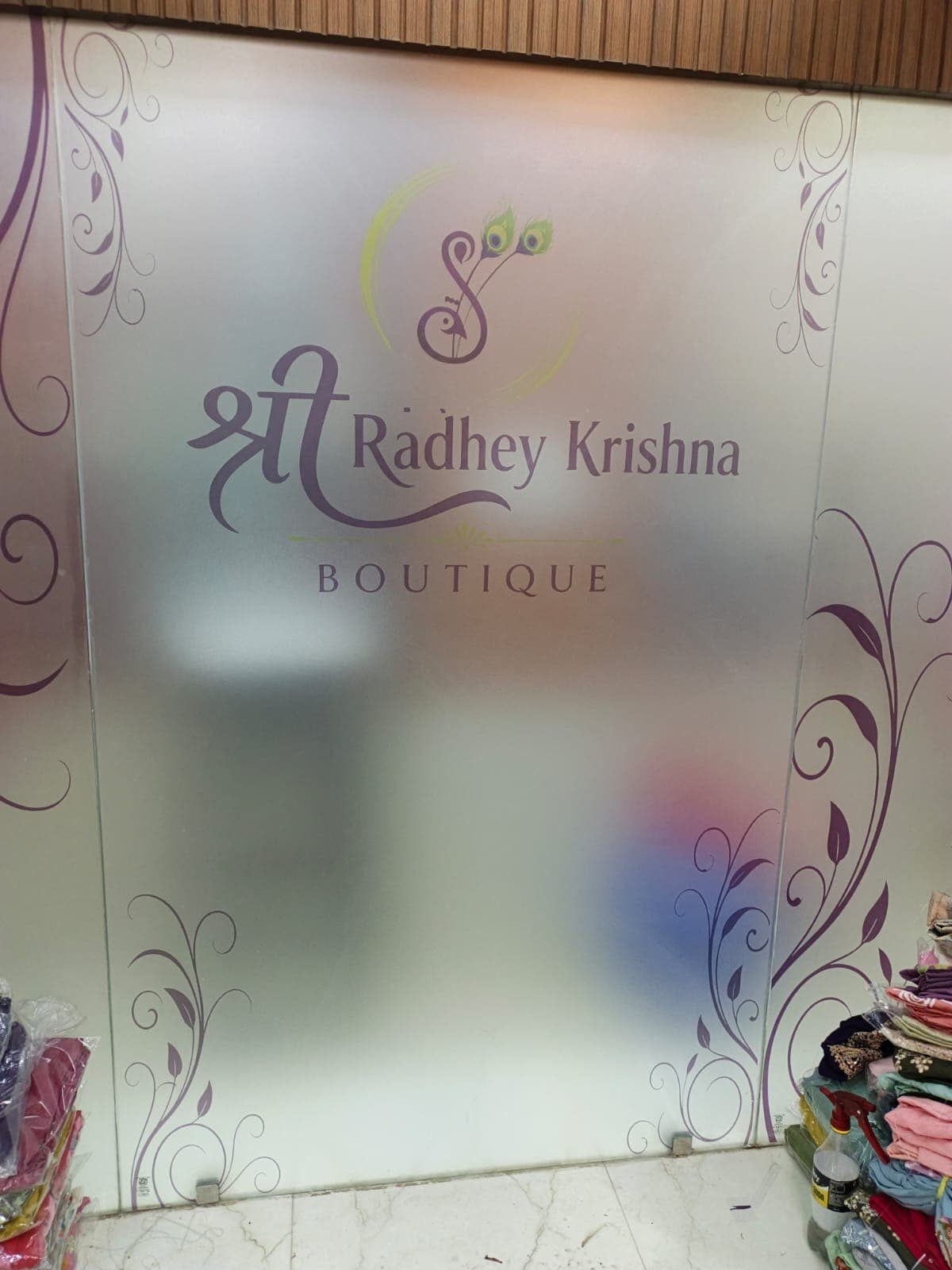 Branded glass film in a retail storefront